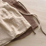 Leichtes Sommerkleid EBBA aus Musselin von Annie & Charles® – bequemes, stilvolles Kleid für Mädchen.