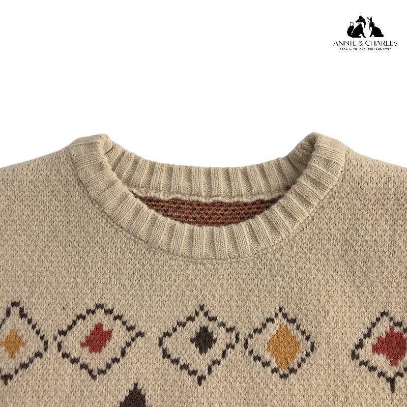 Gestrickter Kinderpullover Annie & Charles AZTEK mit Retro-Rautenmuster in Senfgelb, Rostrot und Braun – weicher Strick für Herbst und Winter.
