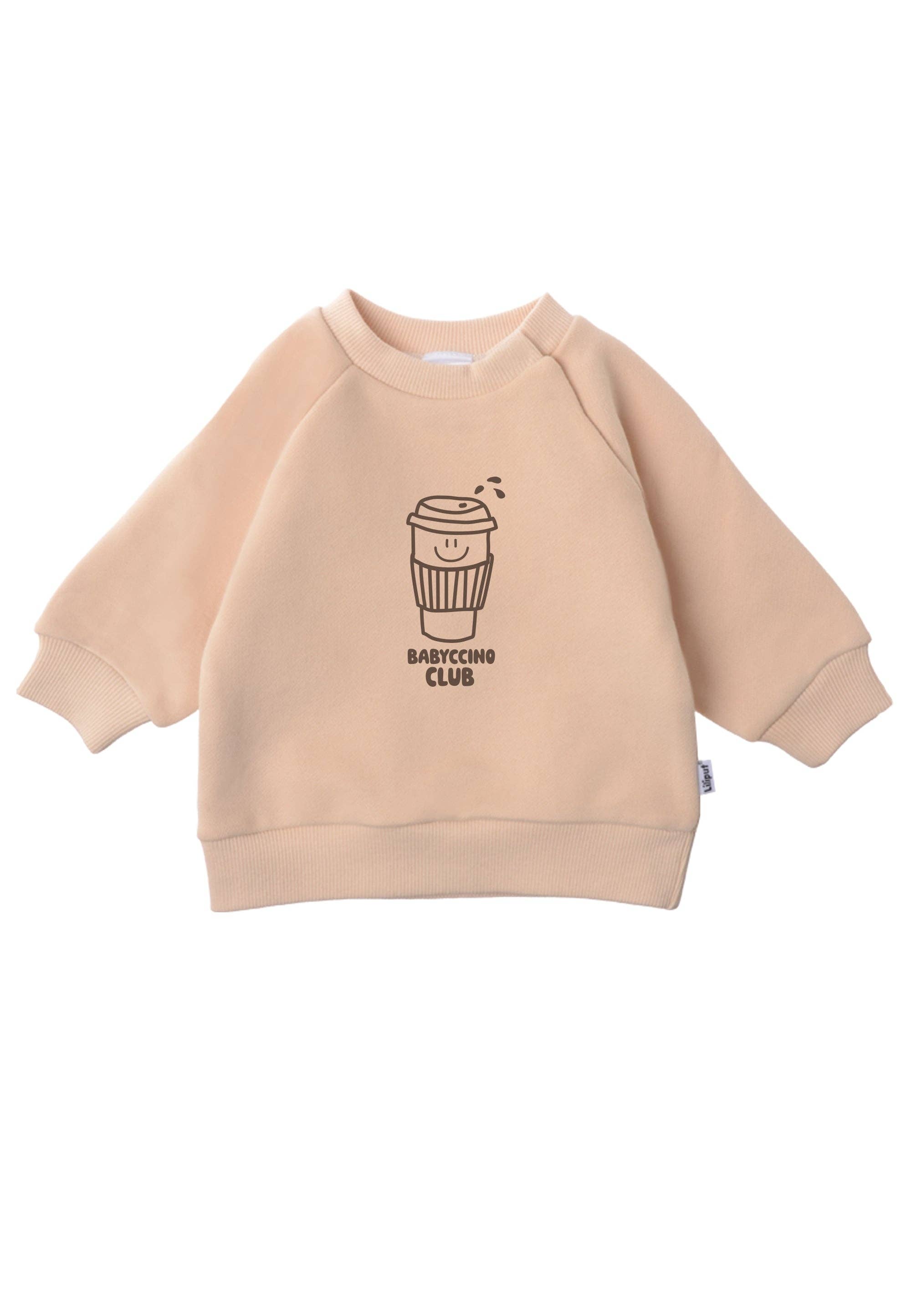 Kuscheliges Baby Outfit Babyccino Club, Sweatshirt Beige mit To Go Cup Print, elastische braune Leggings, angenehm weich und bequem für Alltag und Spiel.