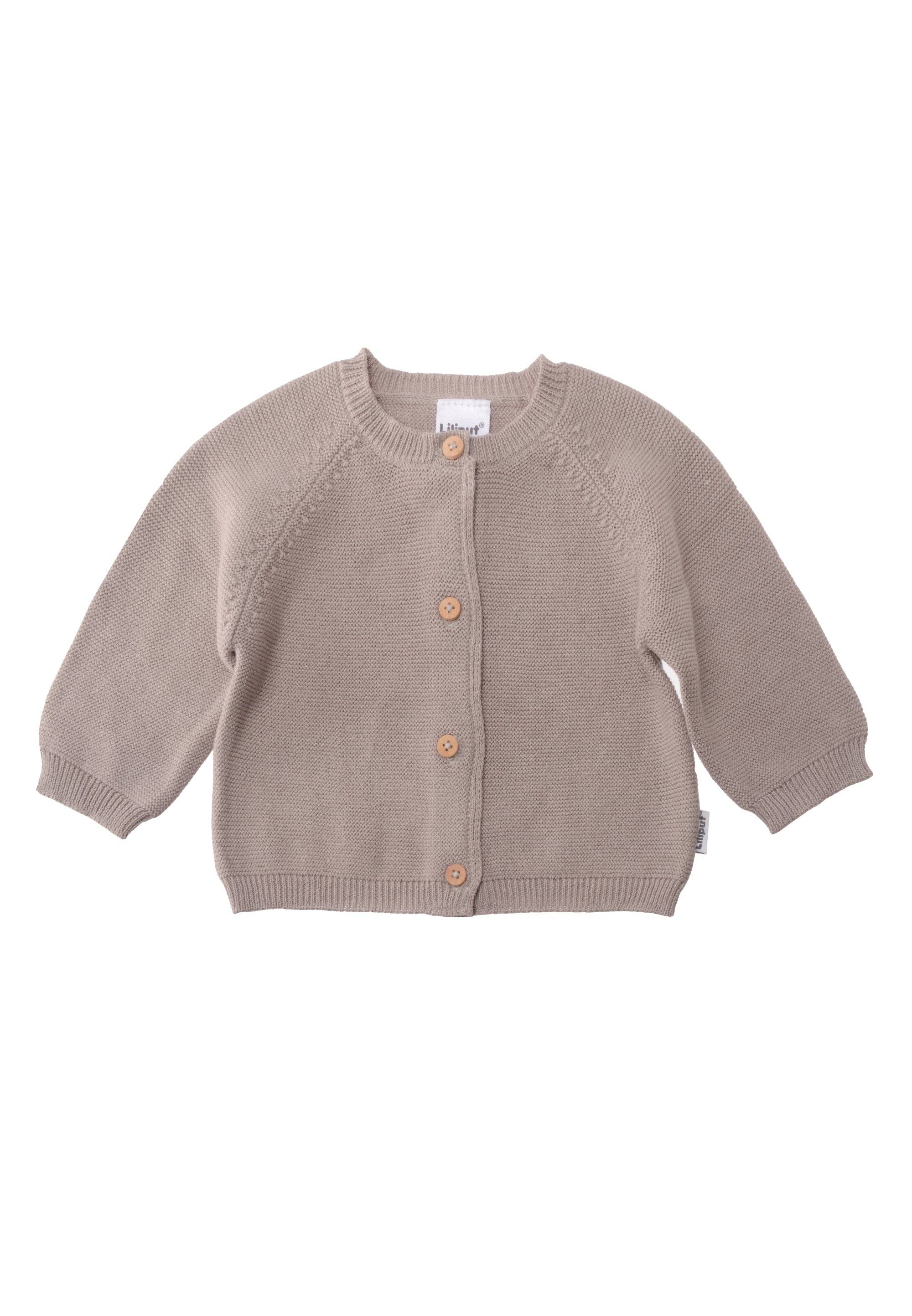 Baby Strickjacke in Taupe mit Holzknöpfen, aus 100% Baumwolle, weiches Strickbild, Raglanärmel, angenehm warm und bequem.