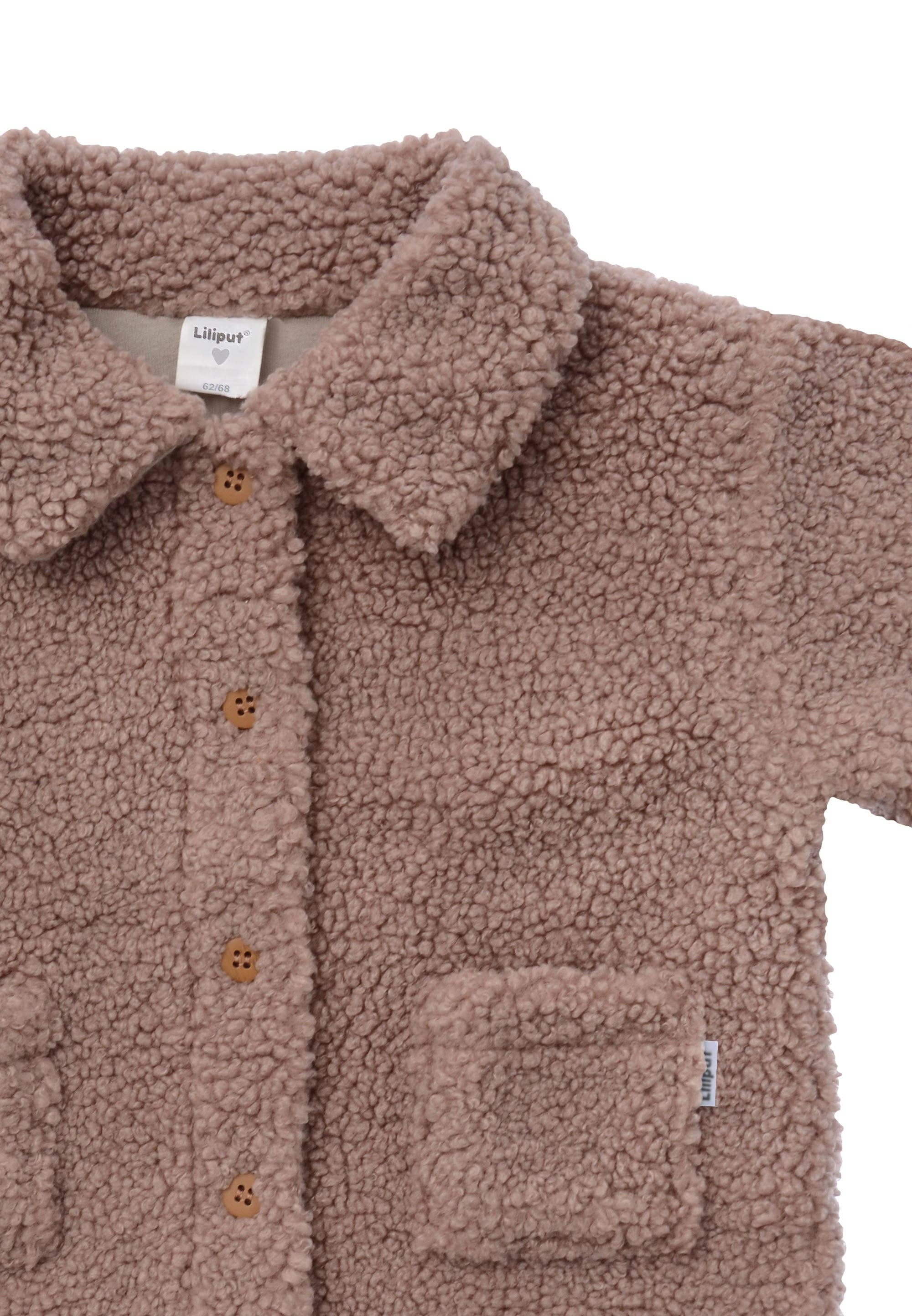 Stylische Boucléfleece Kinderjacke in Altrosa, kuschelig gefüttert, ideal für Spielplatz, Stadt und Übergangszeit.
