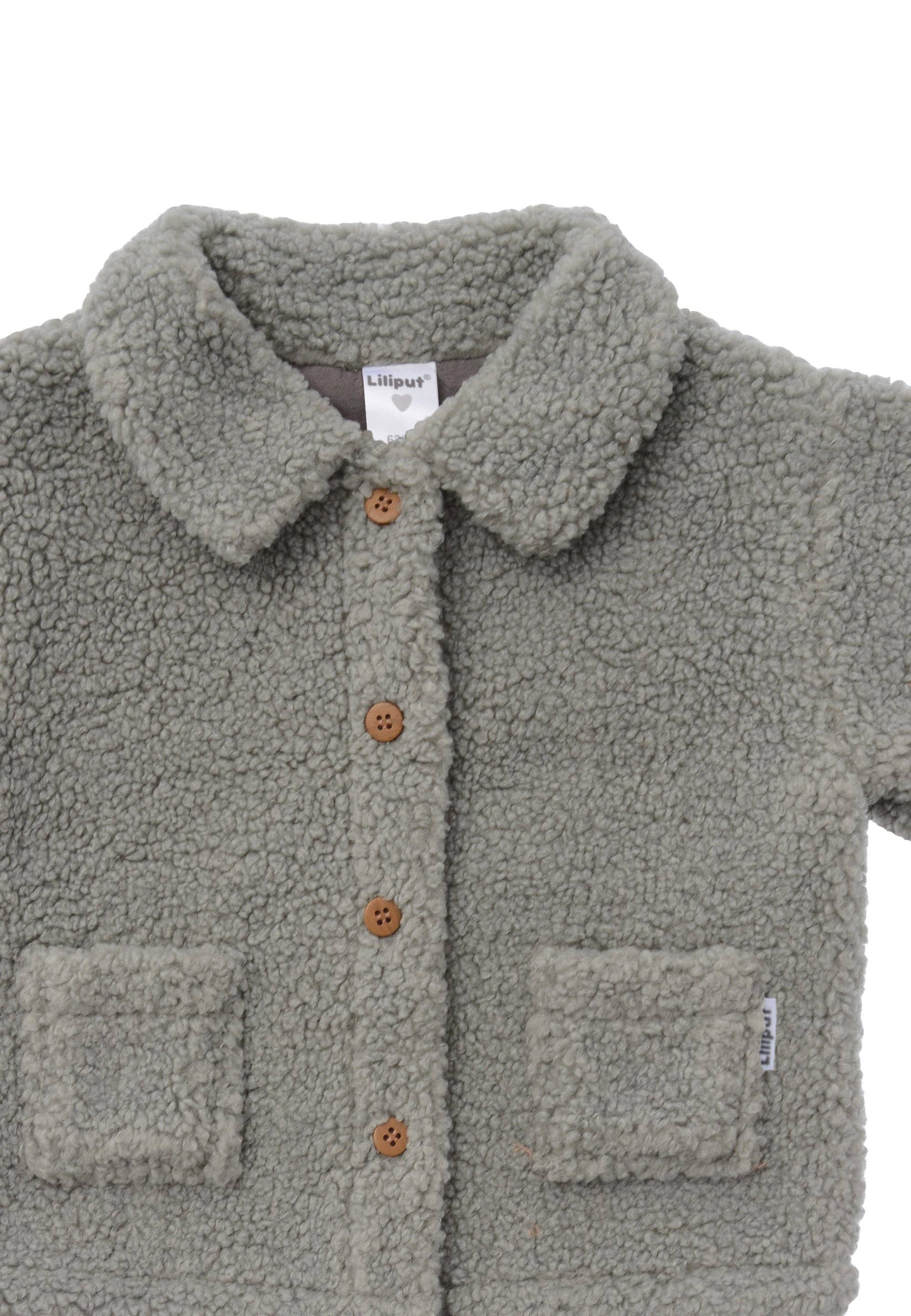 Stylische Boucléfleece Kinderjacke in Grün, kuschelig gefüttert, langlebig und ideal für coole Outfits an kühlen Tagen.