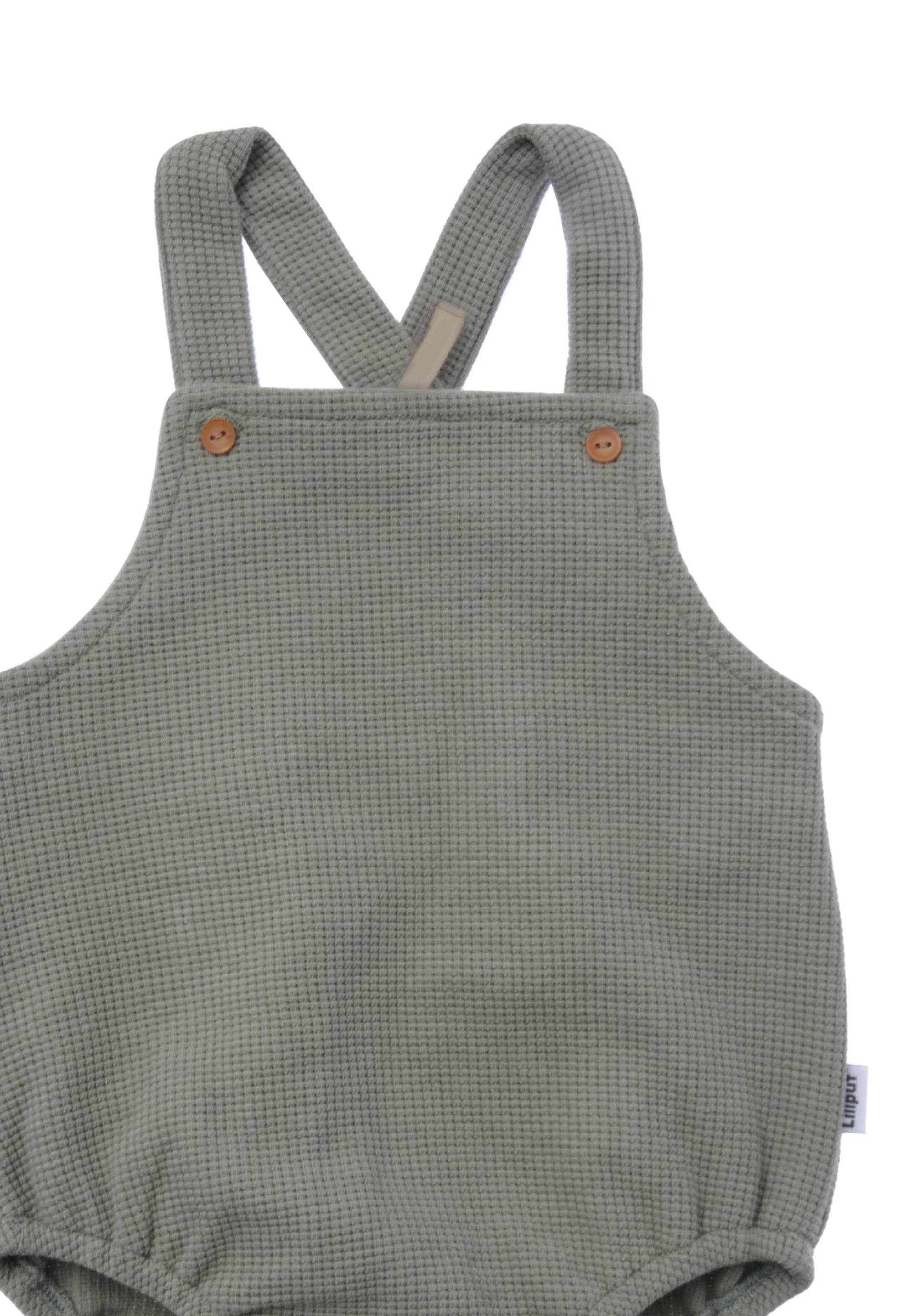 Liliput Baby Latzhose aus Waffel Piqué Oliv, hochwertiger Romper mit fixierten Trägern, atmungsaktiv, bequem und aus Baumwollmischung gefertigt.