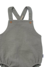 Liliput Baby Latzhose aus Waffel Piqué Oliv, hochwertiger Romper mit fixierten Trägern, atmungsaktiv, bequem und aus Baumwollmischung gefertigt.