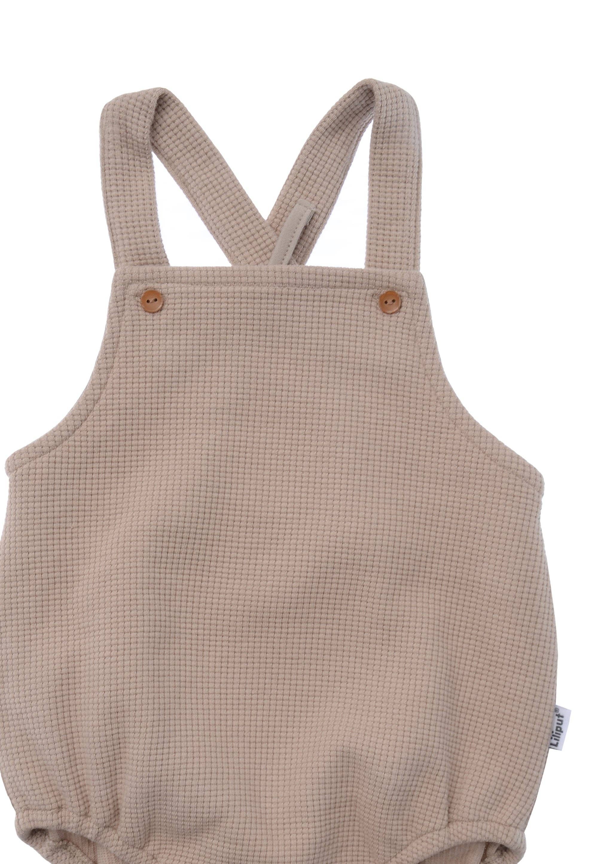 Liliput Latzhose aus Waffel Piqué, hochwertiger Baby Romper mit fixierten Trägern, atmungsaktiv, bequem und aus Baumwollmischung gefertigt.