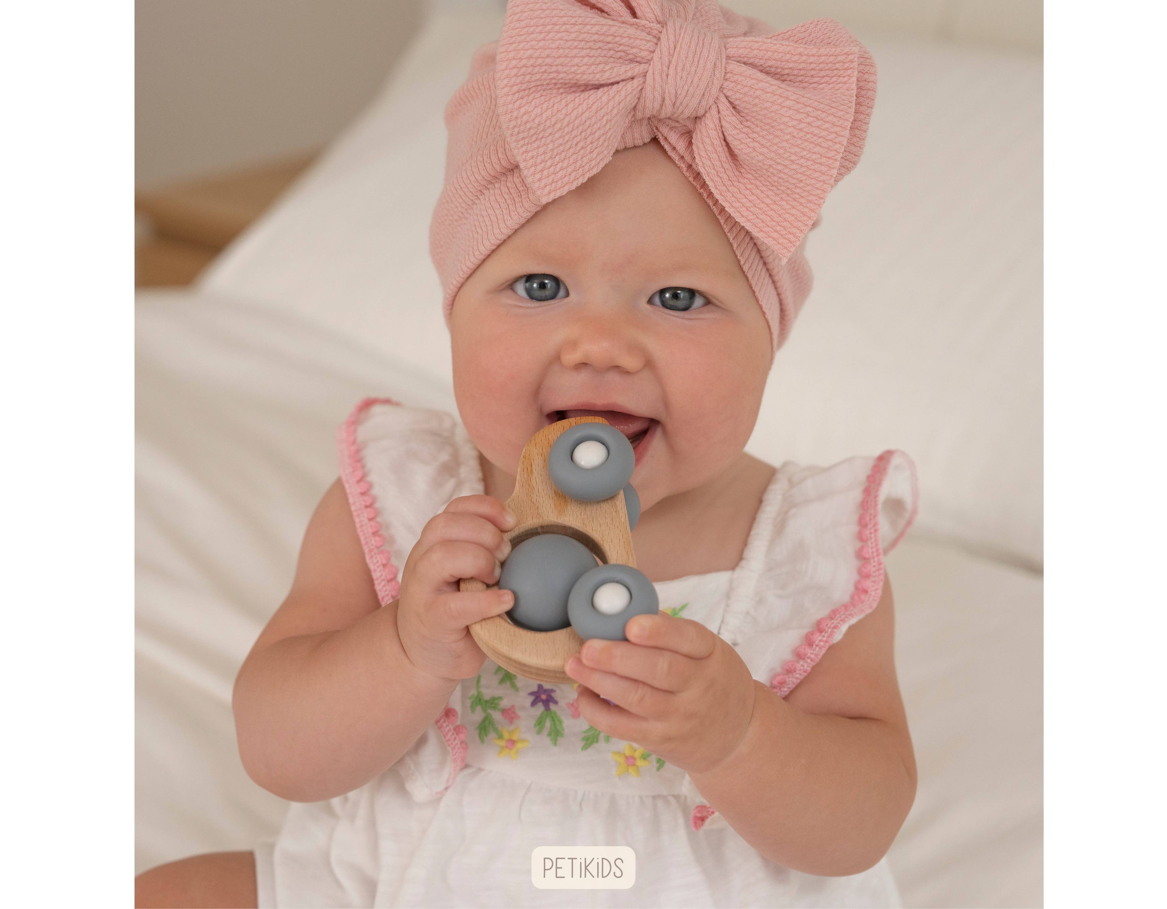 Montessori Babyspielzeugset 3-36 Monate aus Holz und Silikon, fördert Koordination, Motorik, Hand-Auge-Koordination und kreatives Spielen.