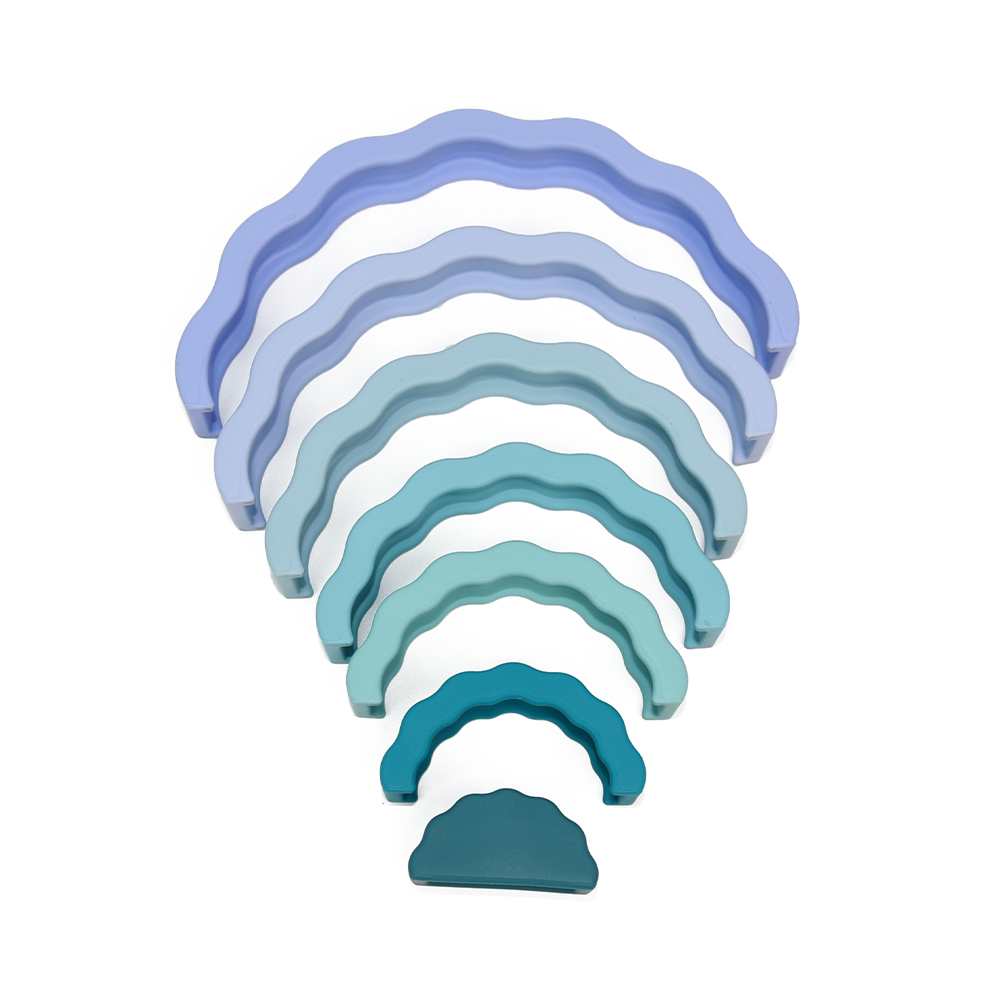 Montessori Stapelspielzeug Silikon-Regenbogen – 7 Bögen in sanften Farben zur Förderung von Feinmotorik, Hand-Auge-Koordination und Kreativität bei Kindern.