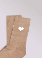 Kinder-Socken in Beige von No Bad Days Club mit eingewebtem Herz, nahtfrei, extra verstärkt unter dem Fuß, nachhaltig produziert in Portugal.