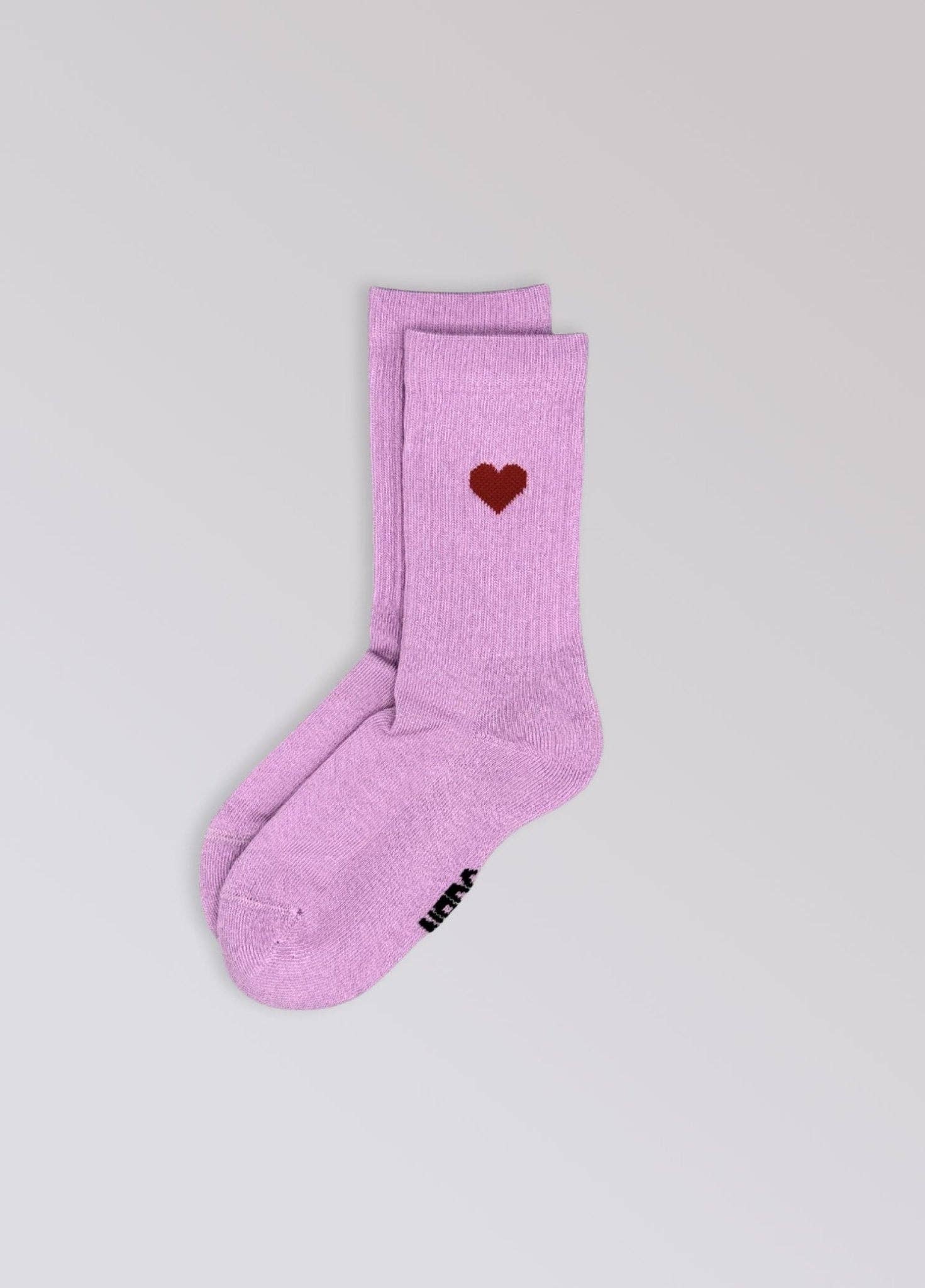 Kinder-Socken in Pink von No Bad Days Club mit eingewebtem Herz, nahtfrei, extra verstärkt unter dem Fuß, nachhaltig produziert in Portugal.