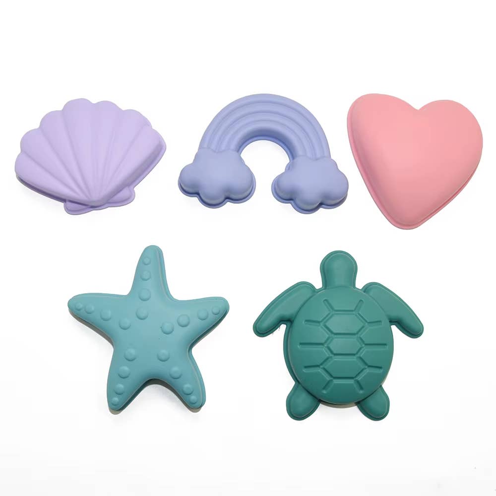Silikon-Strandspielzeug für Kinder – 7-teiliges Set mit Eimer, Schaufel und bunten Sandformen wie Muschel, Regenbogen, Stern, Herz und Schildkröte für kreatives Spielen am Strand.