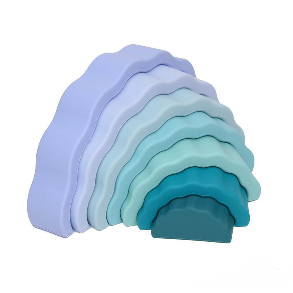 Stapelbarer Silikon-Regenbogen – Montessori-Spielzeug für kreatives Bauen, Fantasie und motorische Entwicklung von Kleinkindern.